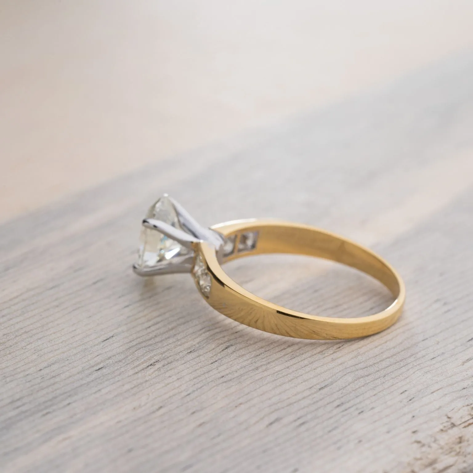 Oval Cut Diamond Engagement Ring in 18K Yellow and White Gold