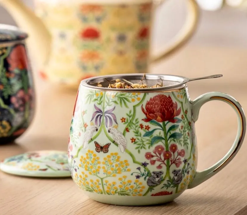Taza de infusión con tapa y filtro.