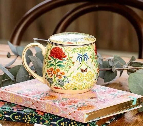 Taza de infusión con tapa y filtro.